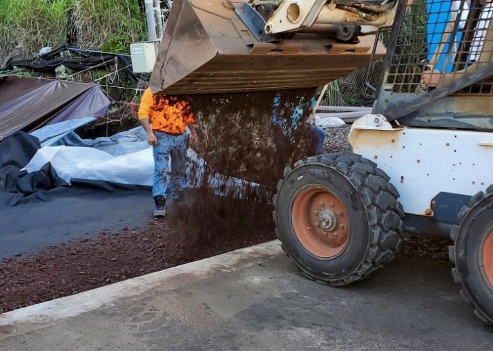 Excavator removing impacted soil at the location of the PFAS release